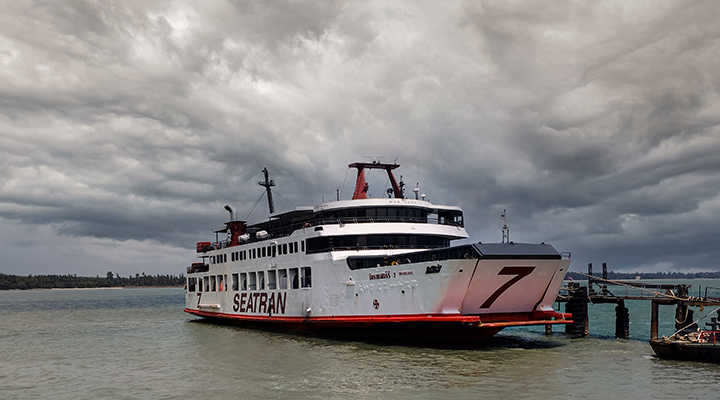 A Seatran ferry embarking from Donsak Pier, crossing the Gulf of Thailand.