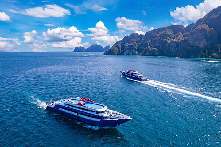 Two Andaman Wave Master ferries cruising between Phuket and Phi Phi islands in the Andaman Sea