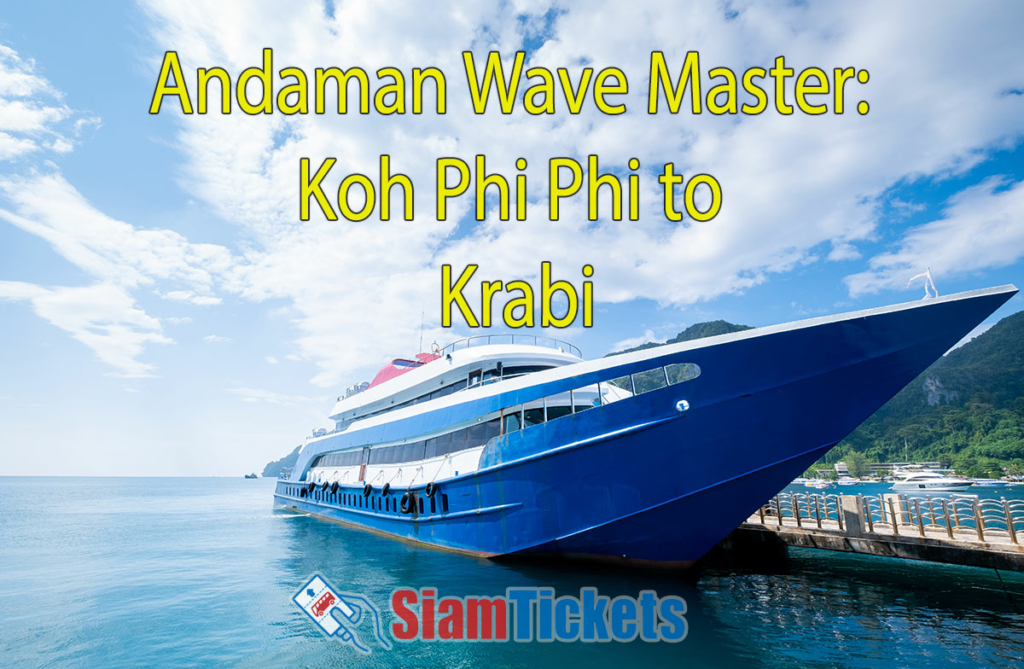 A close-up view of an Andaman Wave Master ferry docked at a pier, with the ocean and a mountainous background. The text "Andaman Wave Master: Koh Phi Phi to Krabi" is in yellow at the top center.